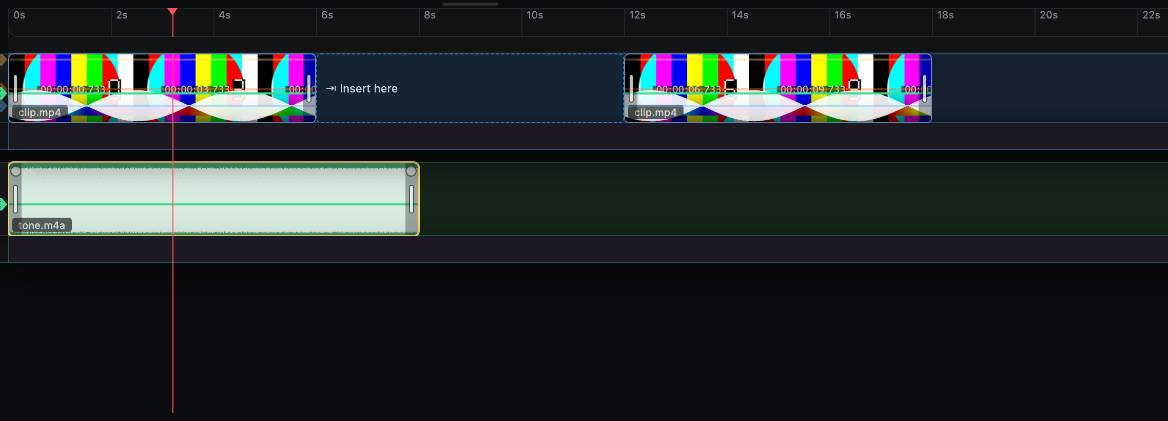 A file dragged over the timeline with an Insert here placeholder